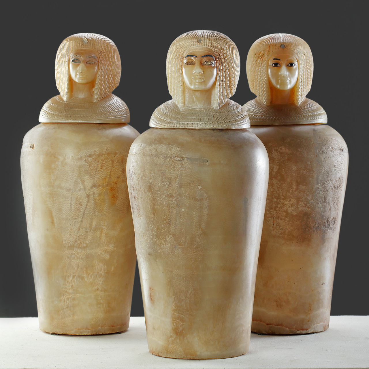 Three Canopic Jars of Kiya with Human-headed Stopper